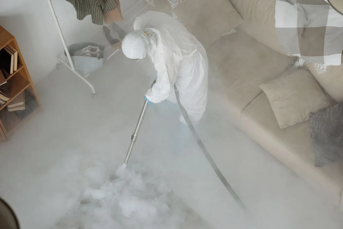 Biohazard cleanup technician in protective equipment, French Island, WI